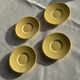 Set of 4 vintage yellow Italian espresso cups and saucers.