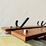 Vintage wall-mounted coat rack in wood and black metal