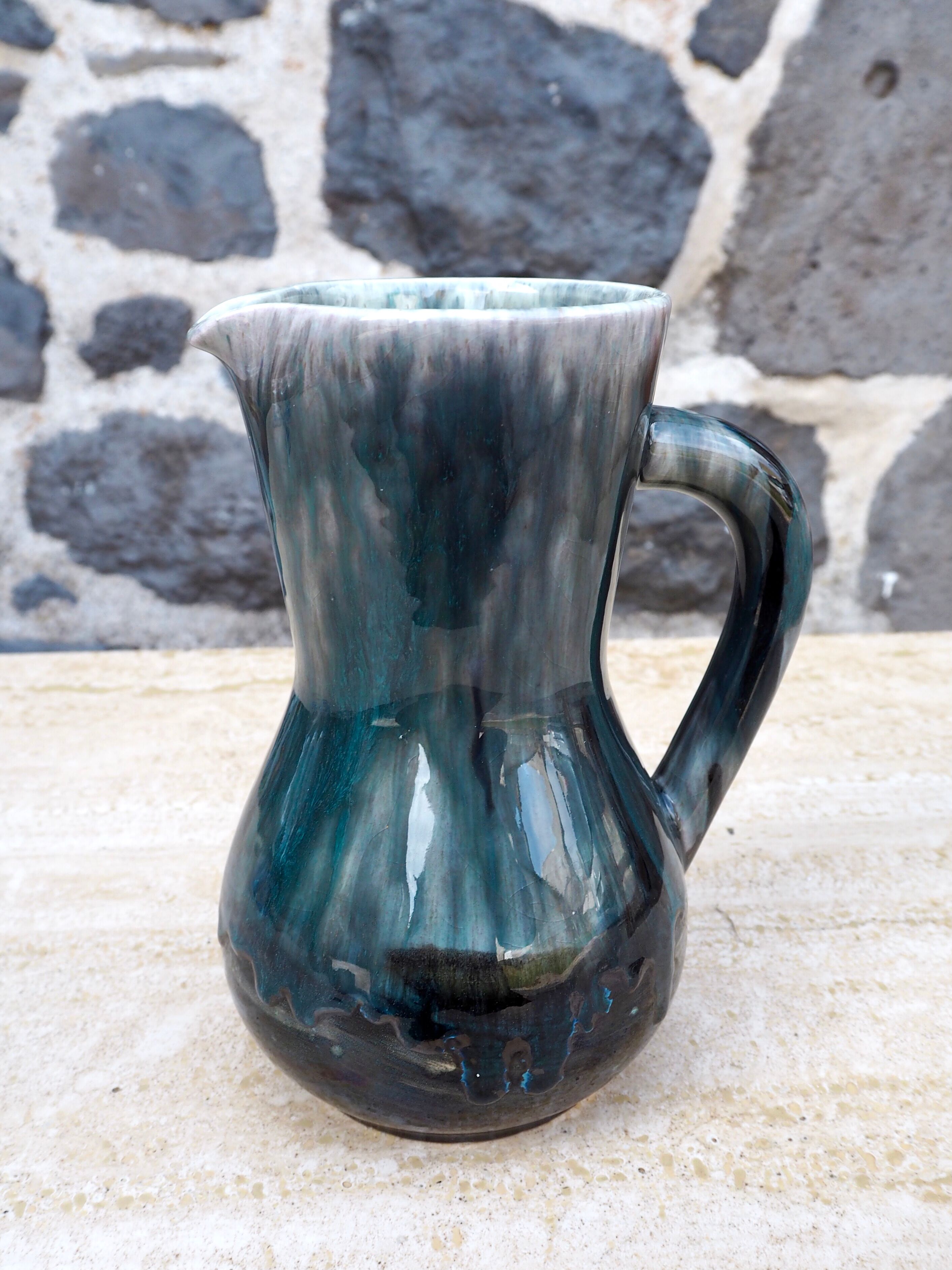 Enamelled ceramic pitcher signed Morvan