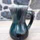 Enamelled ceramic pitcher signed Morvan