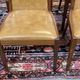 Set of 4 G-Plan chairs in teak and faux leather from the 1970s.