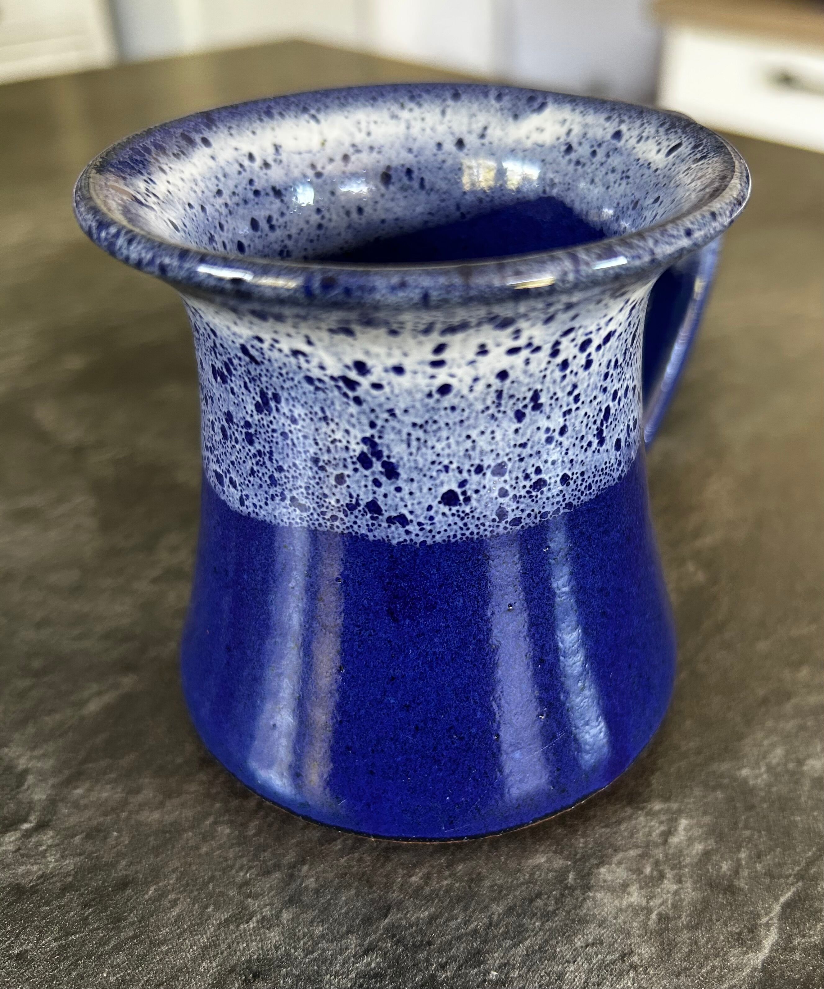 Small enamelled earthenware milk jug
