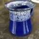 Small enamelled earthenware milk jug