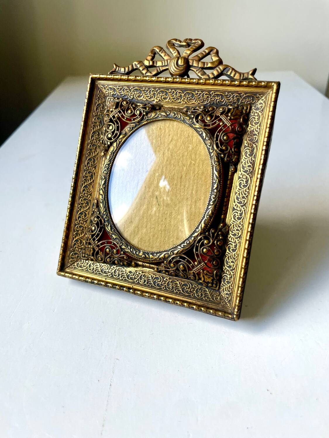 Antique metal frame gold coloured brass   frame 10.5 cm x 9 cm  convex glass