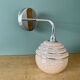 Vintage golden globe elbow wall light in pink and silver Clichy glass