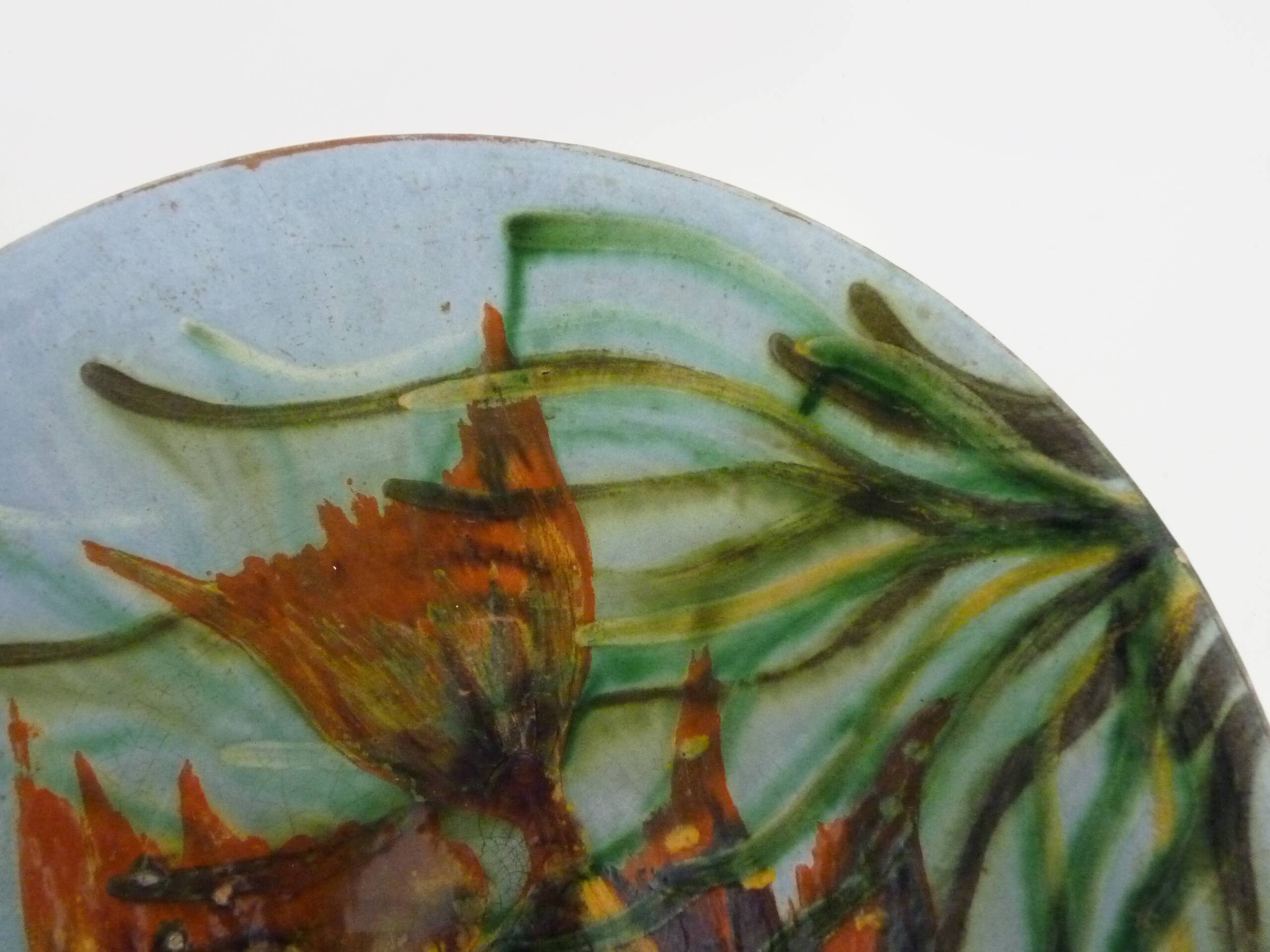 Decorative ceramic wall plate with fish decoration by Puigdemont.