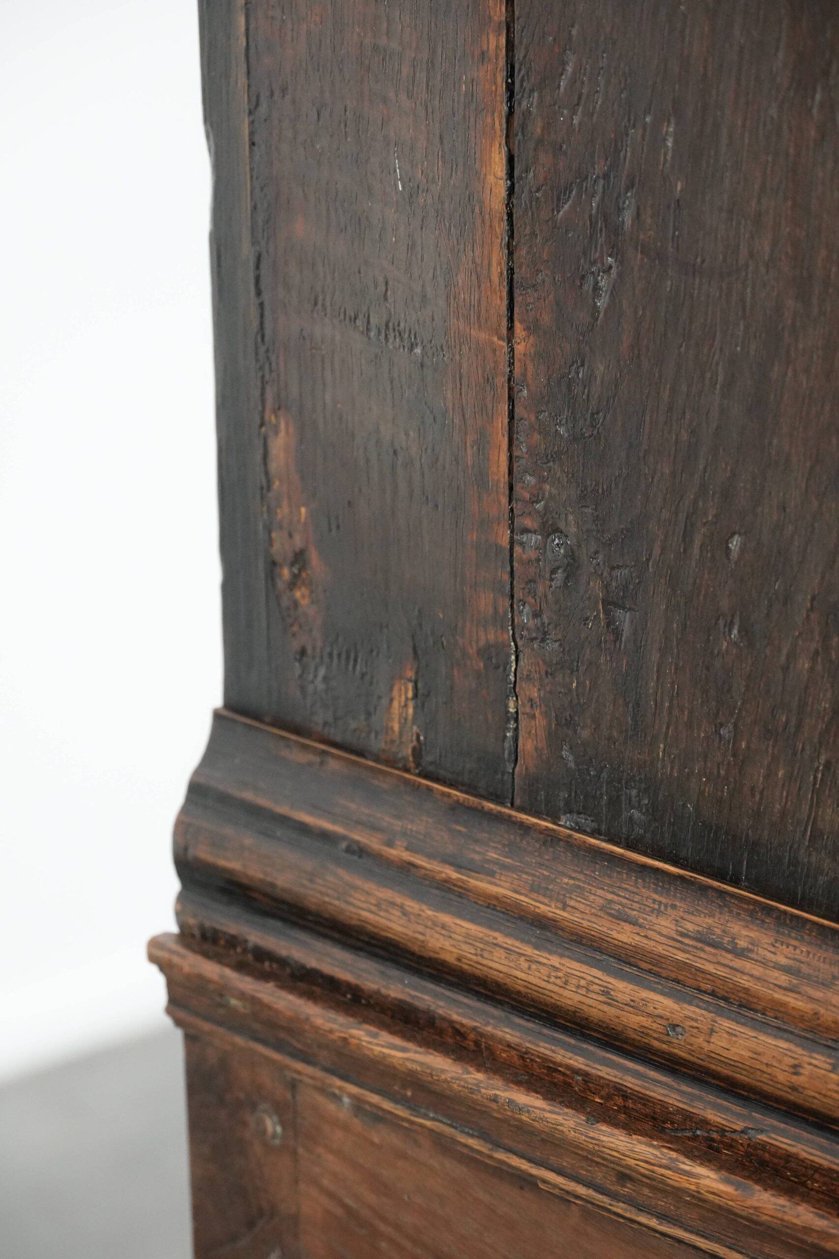 Unique antique English cabinet on stand made of oak from the 17th century