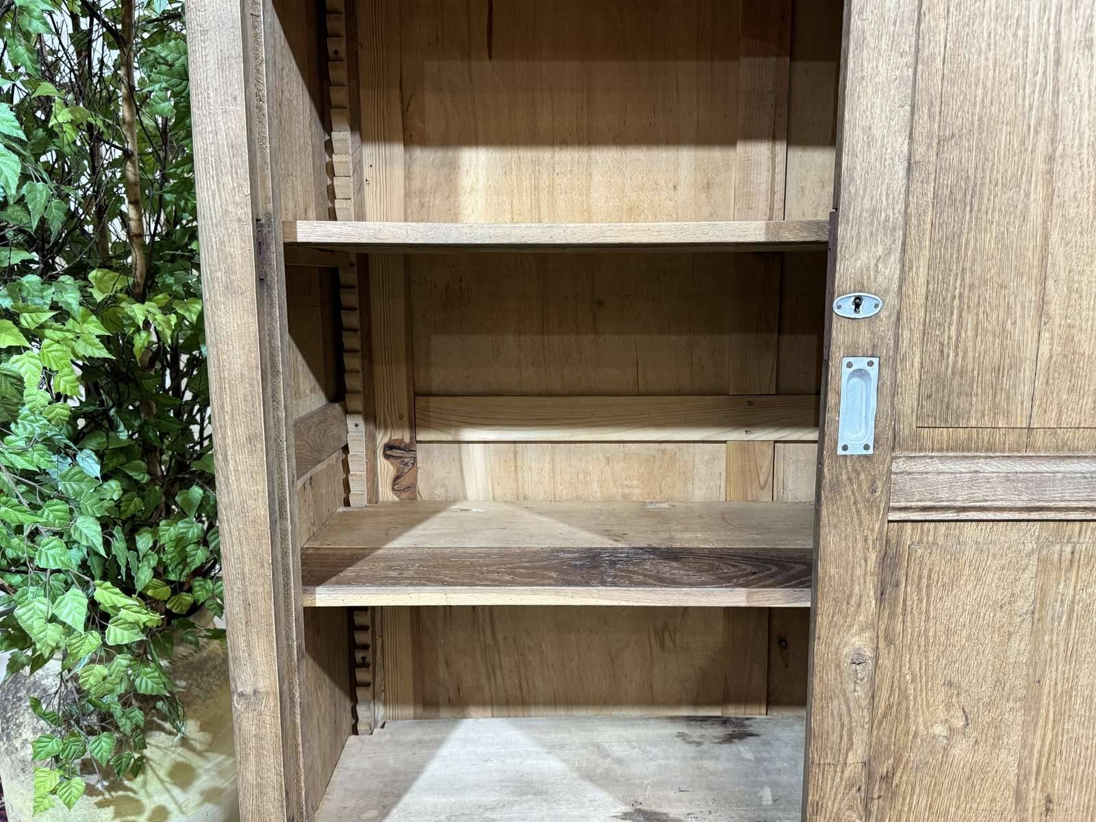 Oak wardrobe with sliding doors from the 1930s.