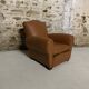 Pair of vintage club style armchairs in camel faux leather.
