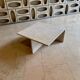 Square travertine coffee table by Giusti and Di Rosa for UP&UP.