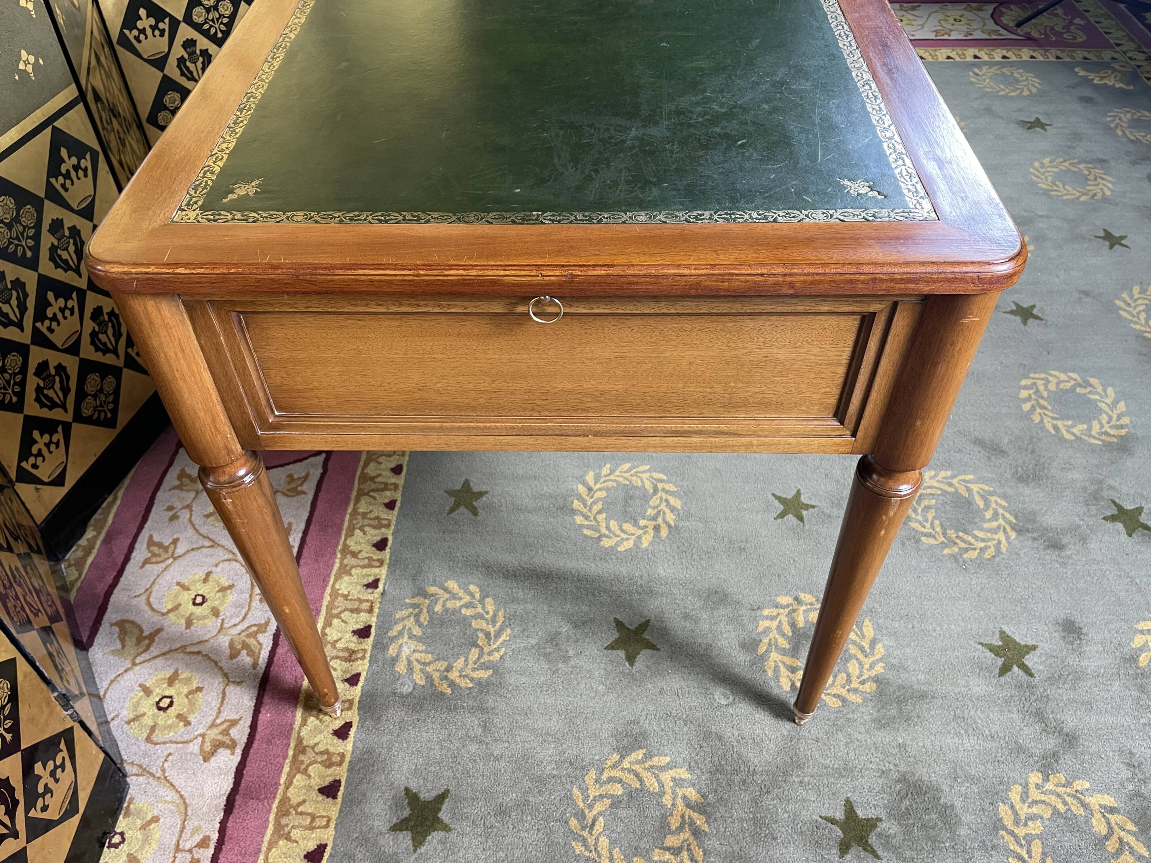 Louis XVI style flat desk in mahogany and green leather