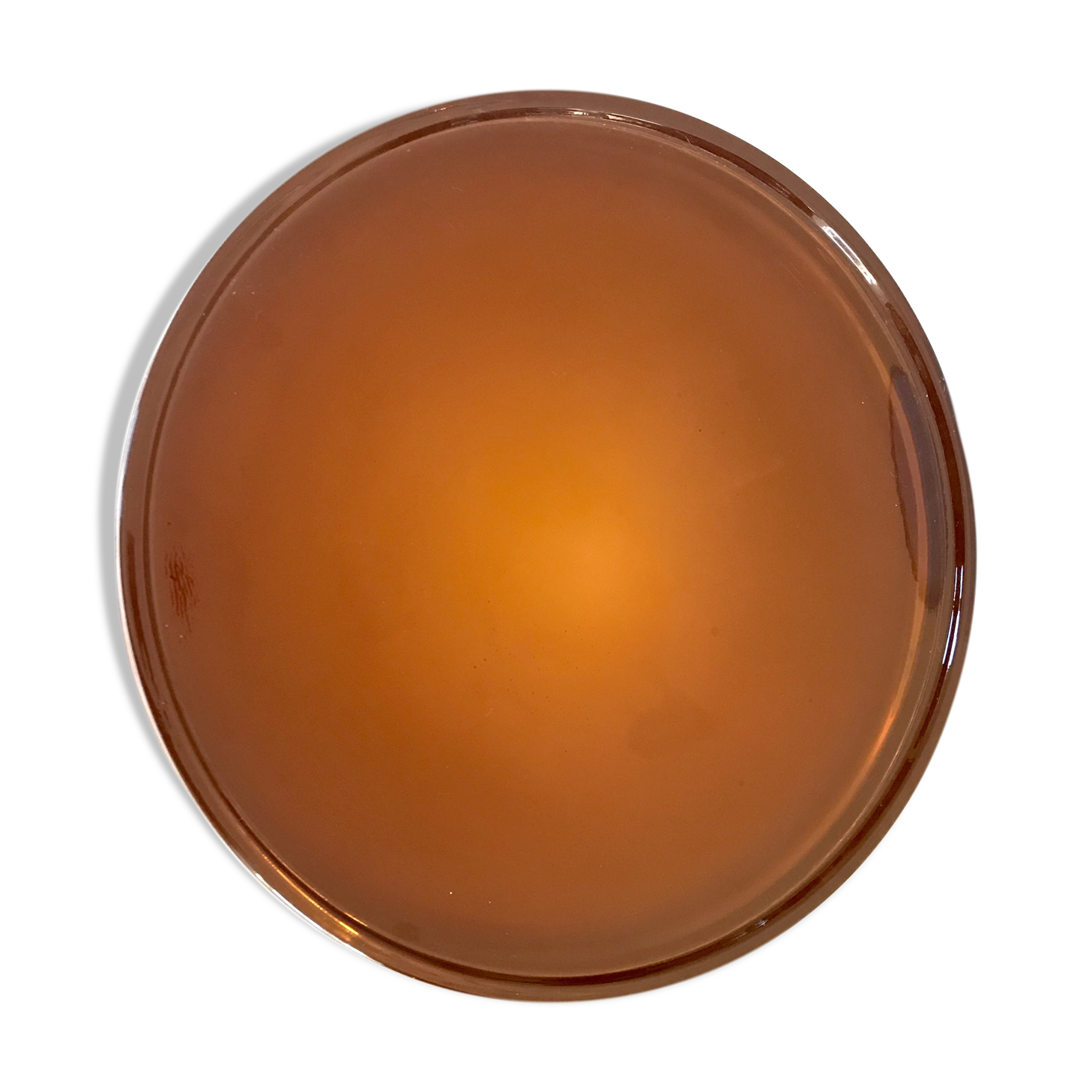 Empty vintage amber glass pocket