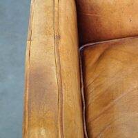 Set of English style light cognac colored leather armchairs.