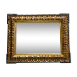Gold-tinted wooden and stucco rectangular mirror - 1920
