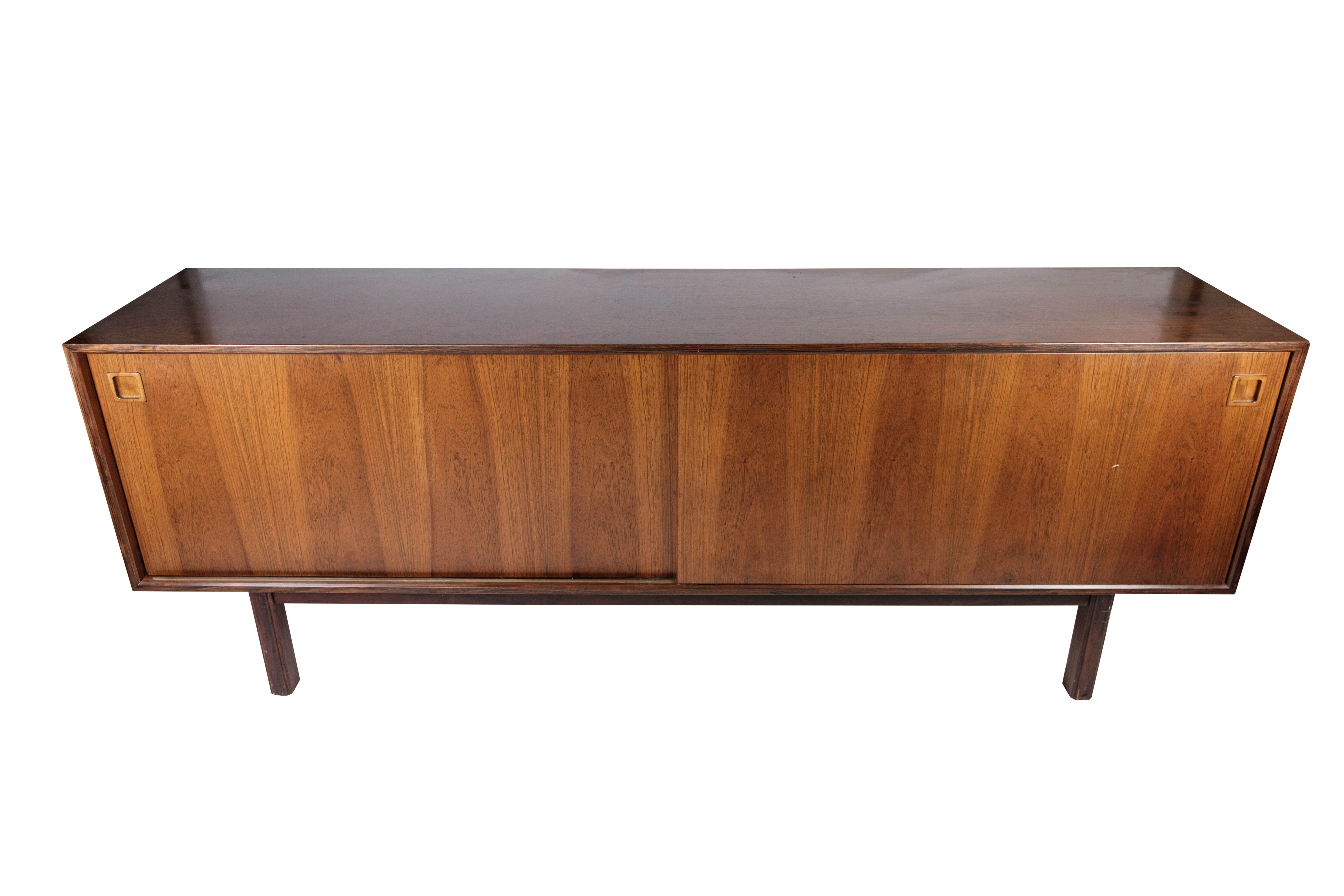 Sideboard in rosewood with sliding doors designed by Omann Junior from the 1960s.