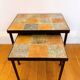 Nest tables in ceramic and metal