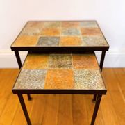 Nest tables in ceramic and metal