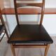 5 Scandinavian style chairs, wood and black faux leather.