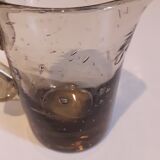 Miniature pitcher in bubbled glass blown smoked color