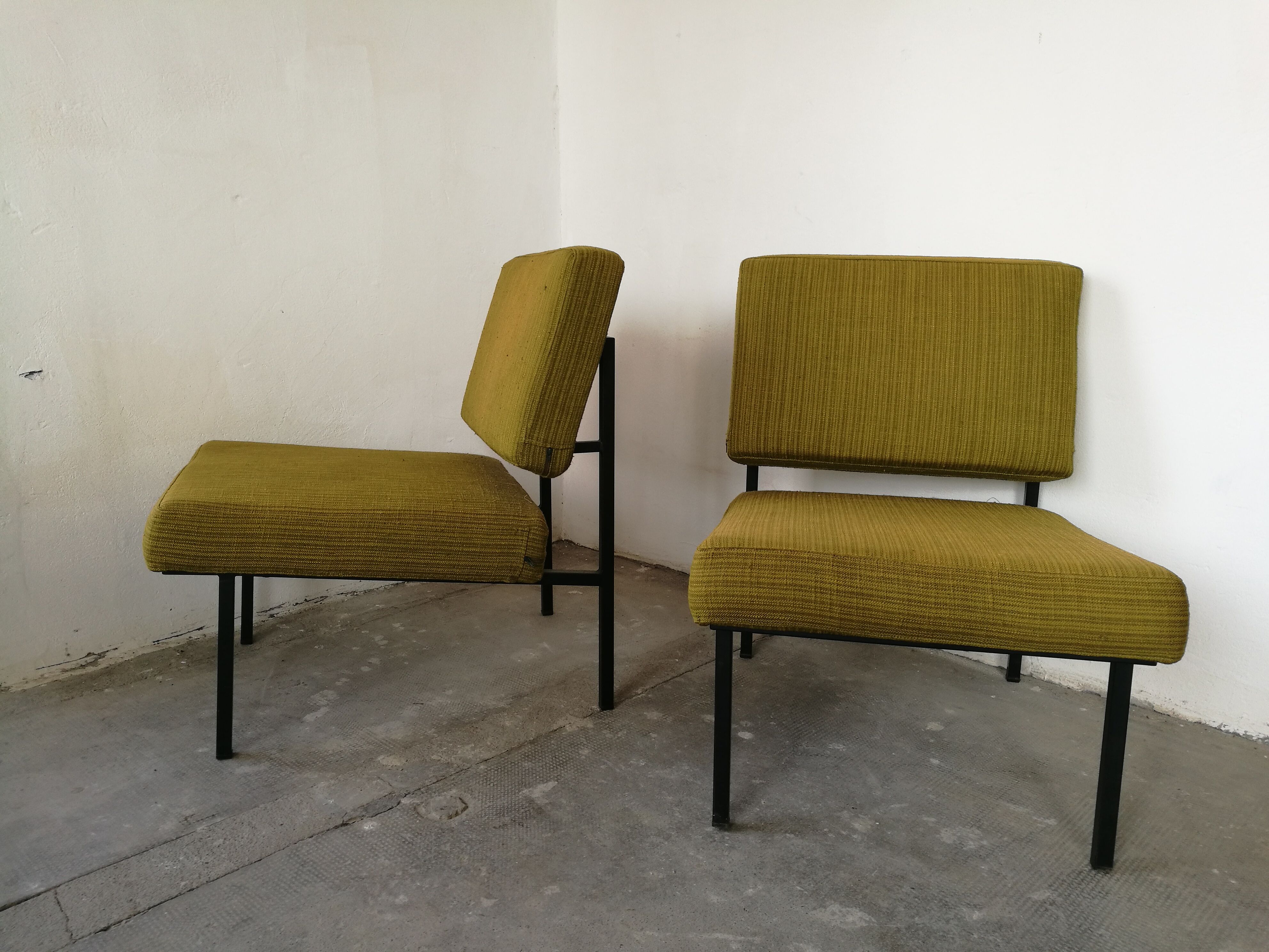pair of André Simard armchairs for Airborne