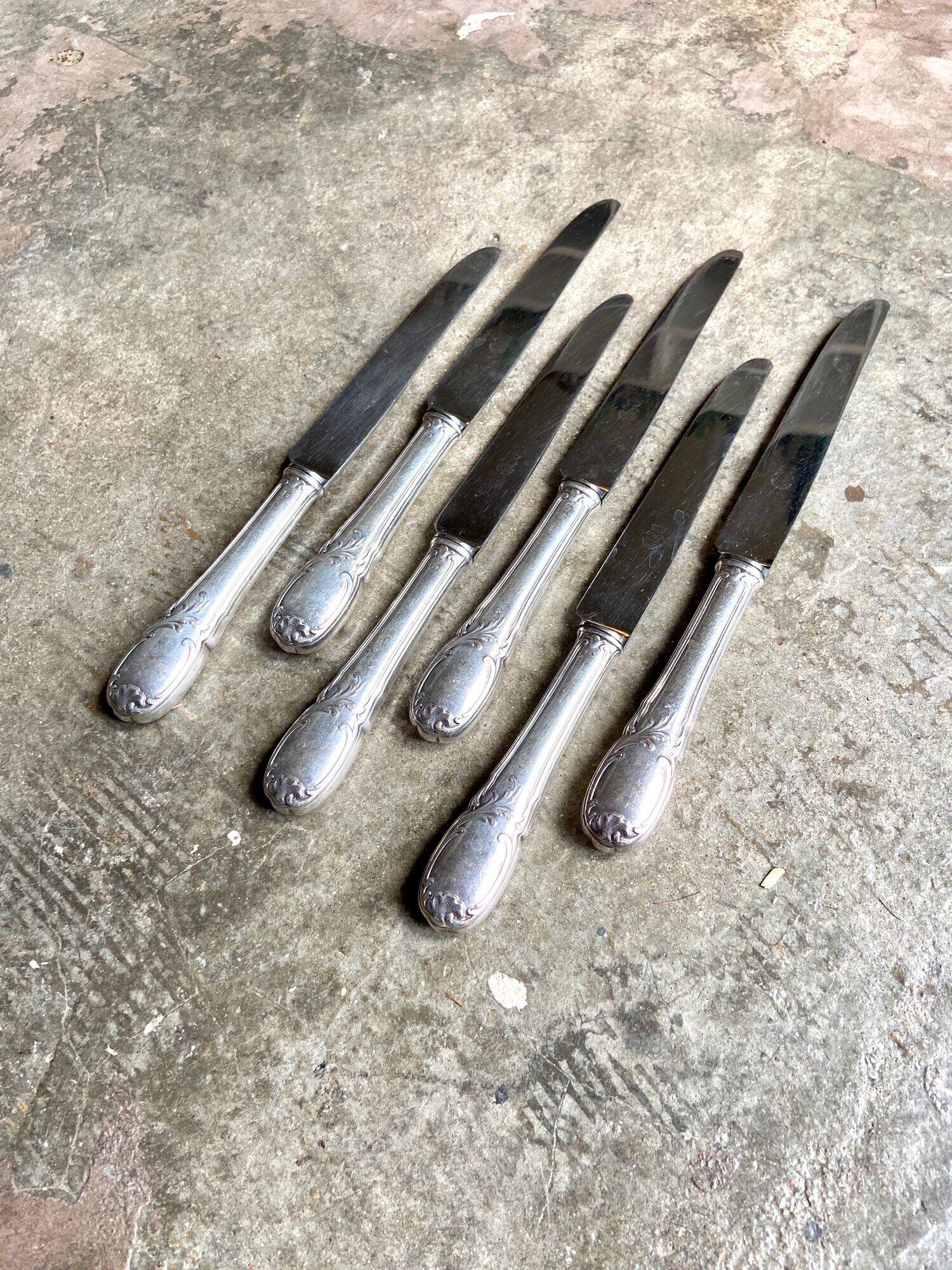 6 silver metal knives