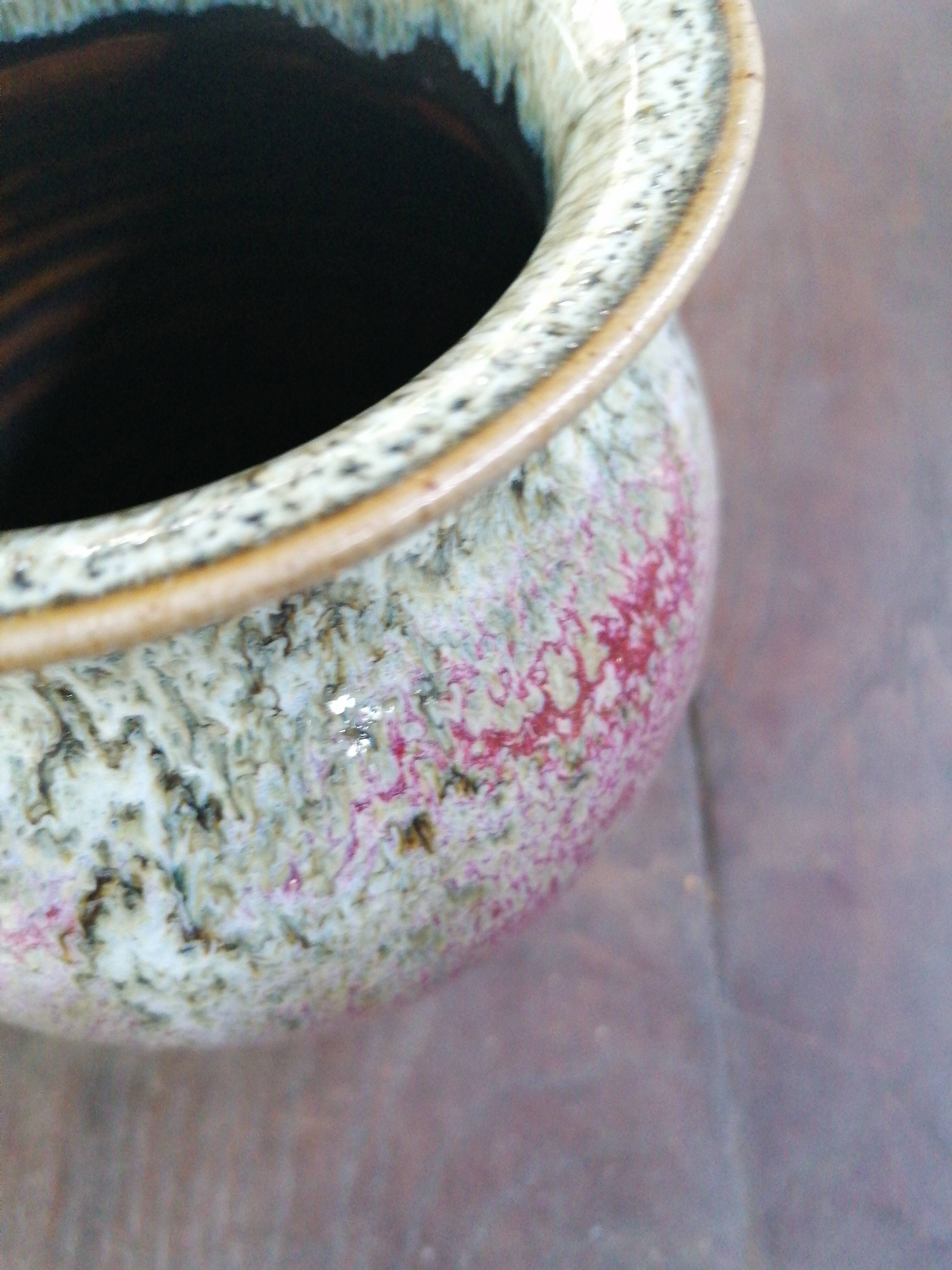 Green/pink speckled ceramic vase
