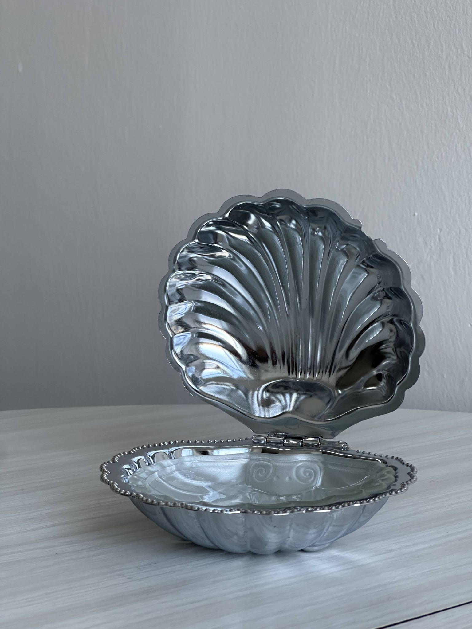 Silver metal butter dish with lid and matching spoon