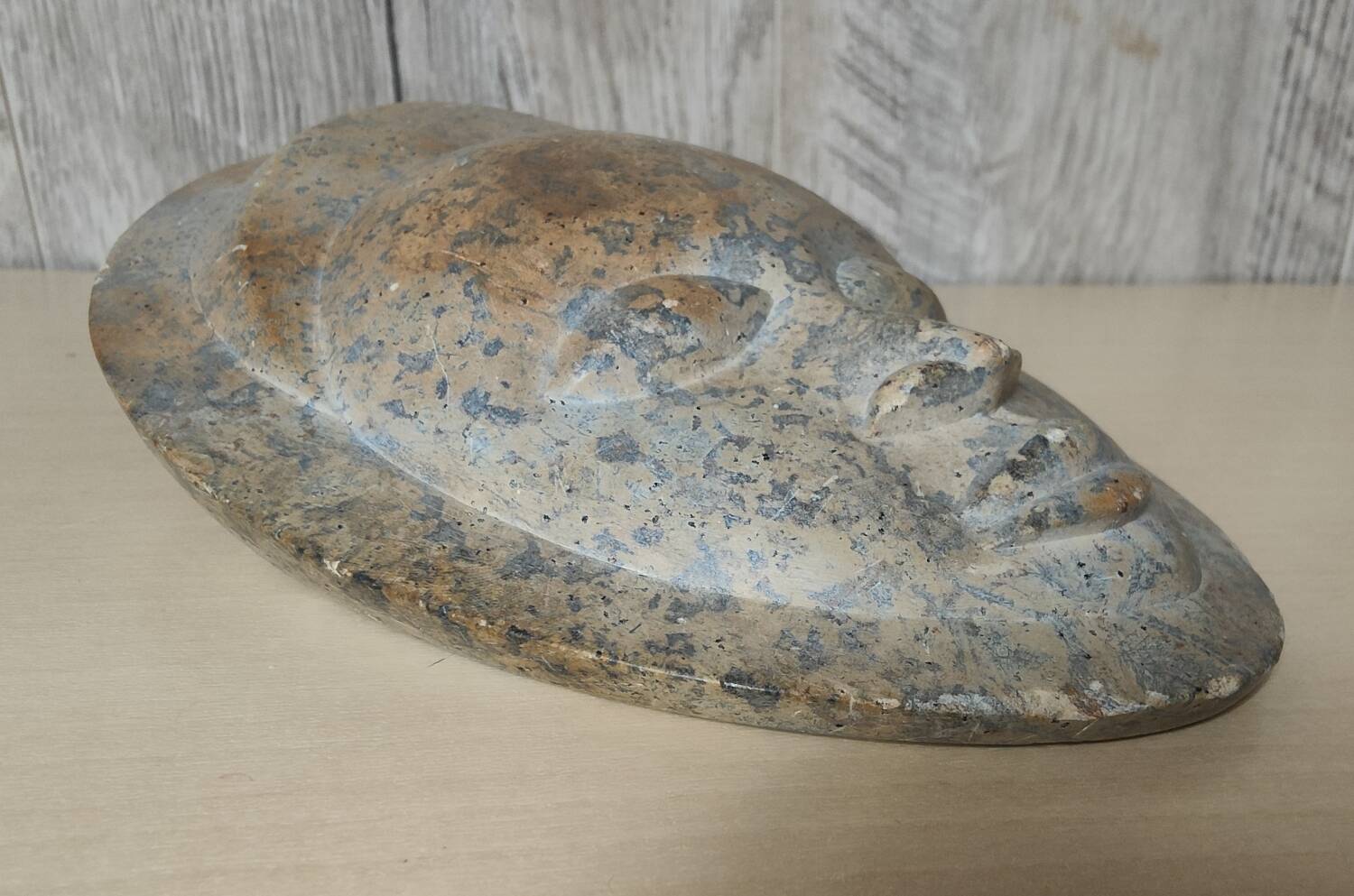 African stone face sculpture