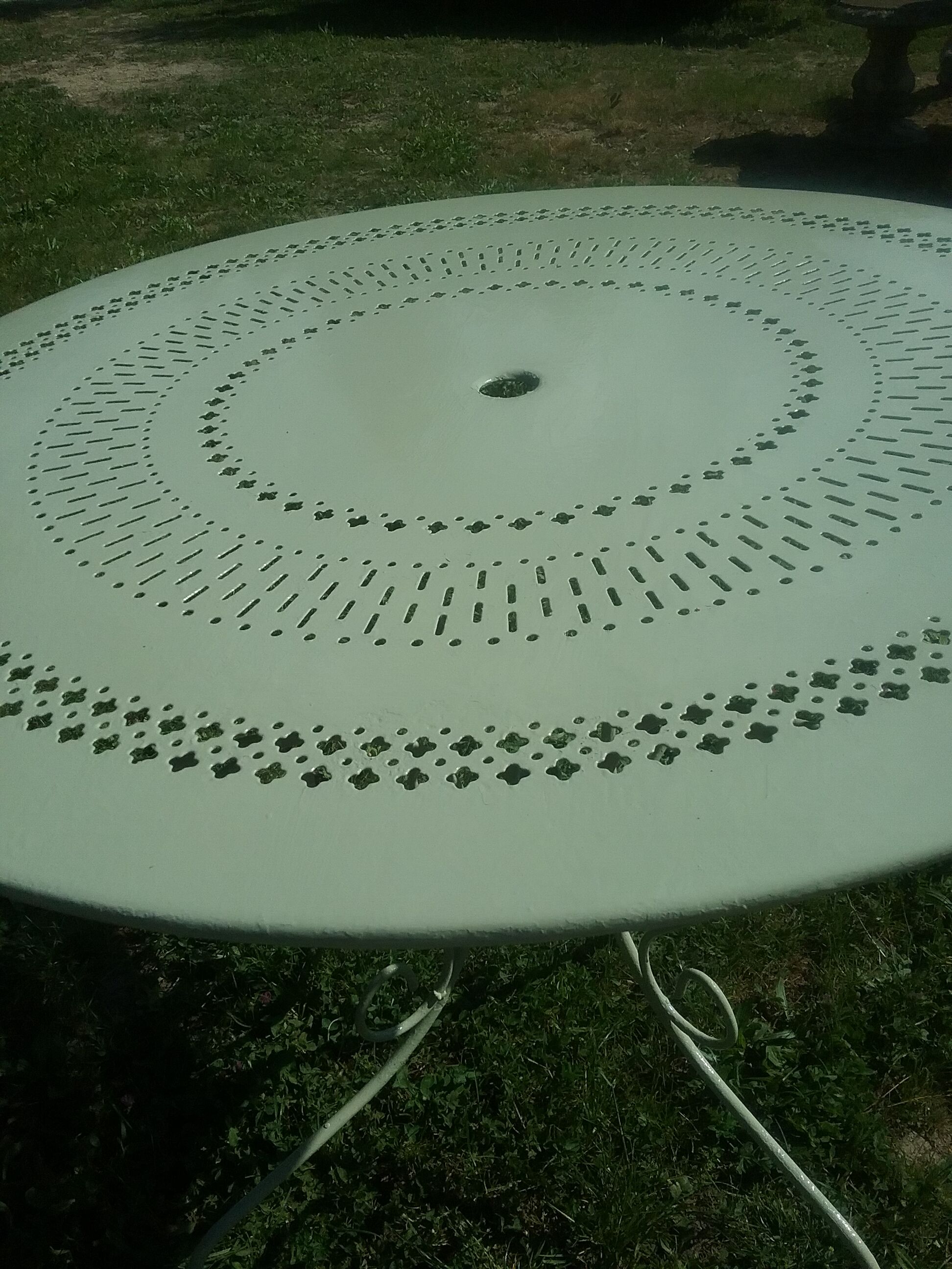 Green wrought iron garden furniture