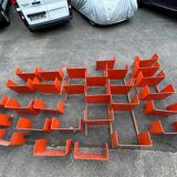 Large modular bookcase shelf in orange thermoformed wood circa 1970