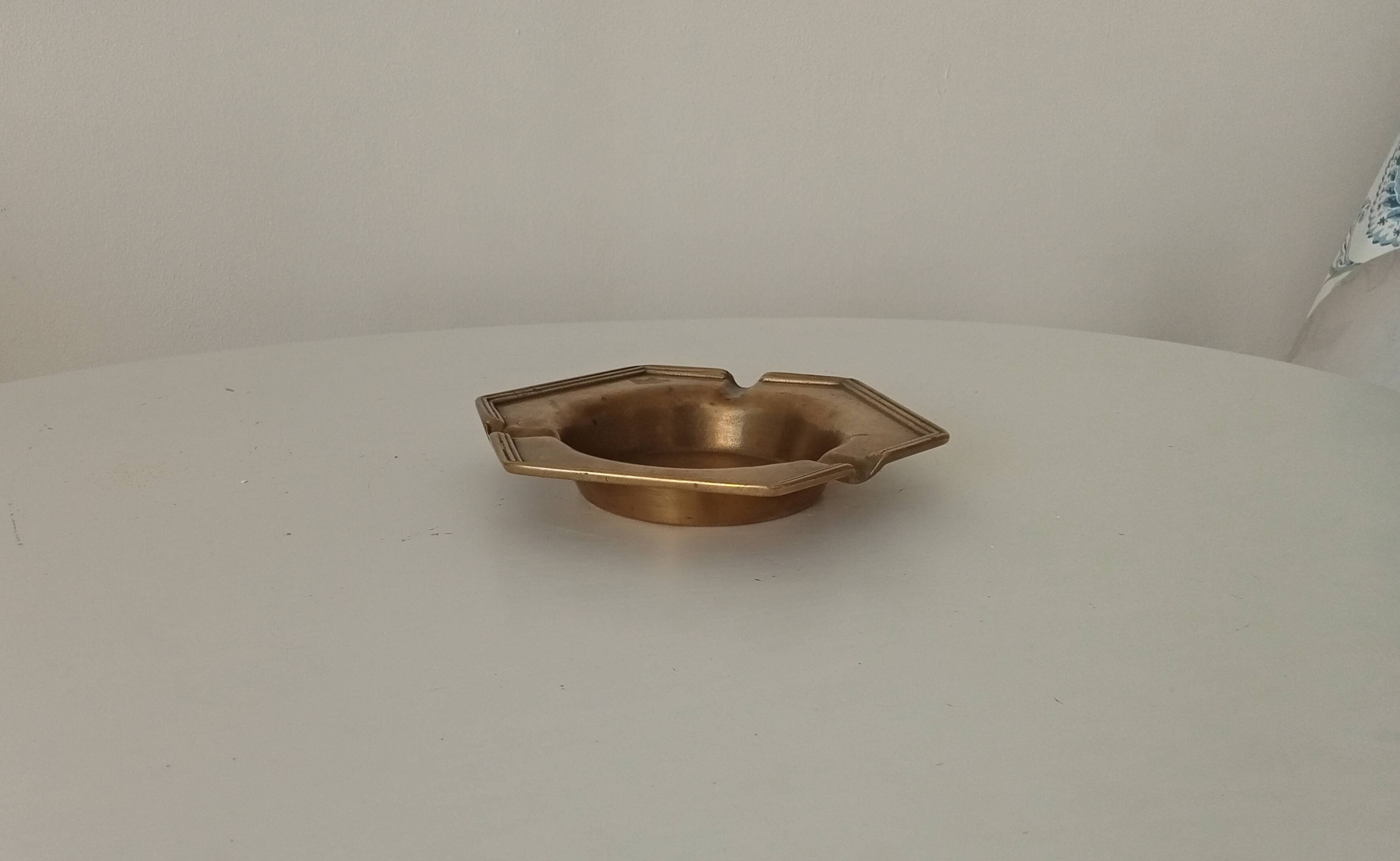 Antique ashtray in solid gilded brass