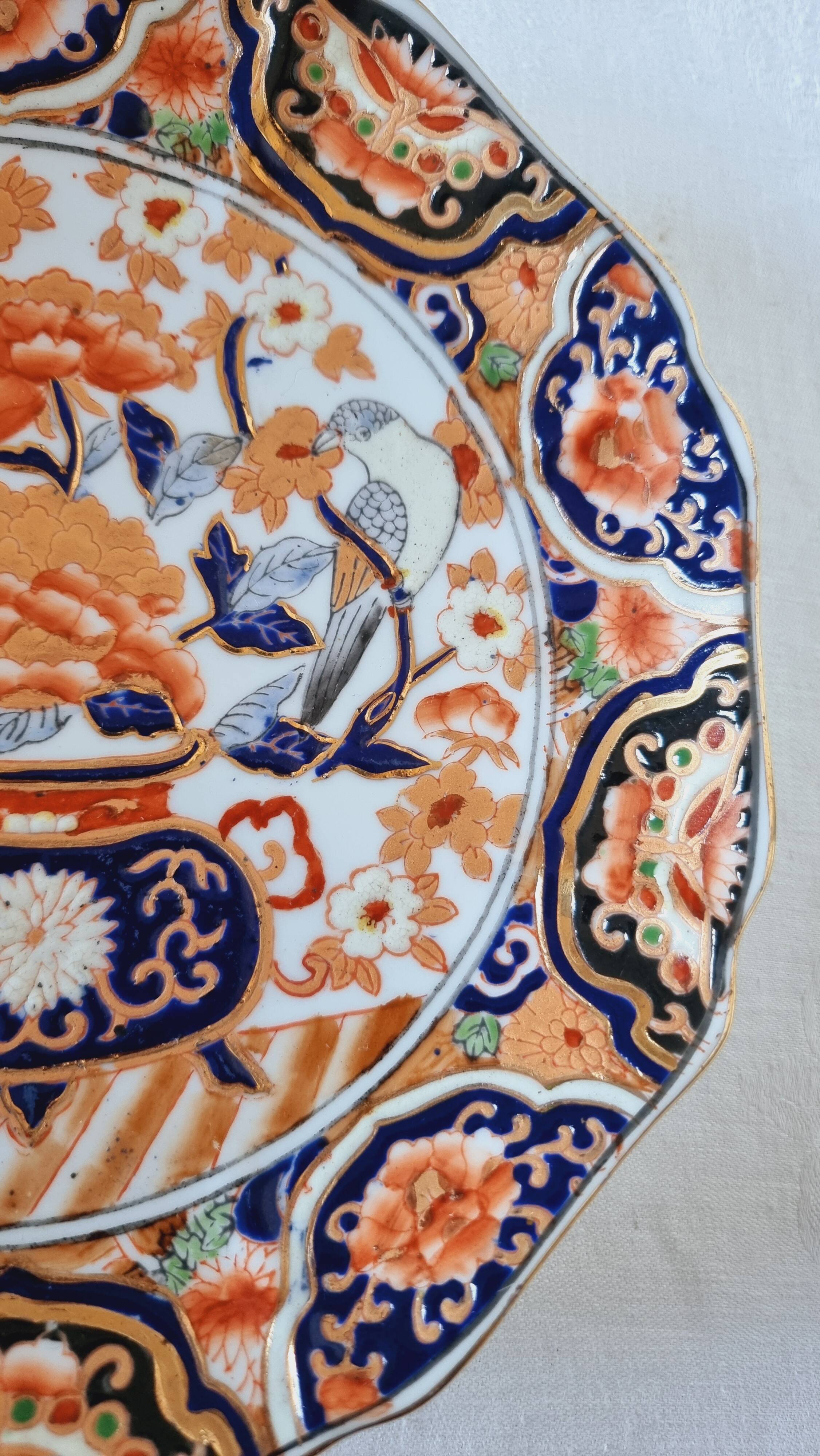 Imari-style porcelain plate, hand-painted, Japan, mid-20th century.
