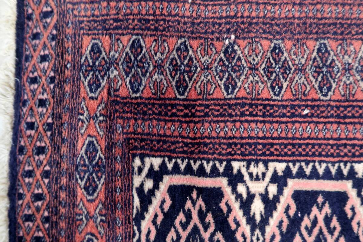 Handmade vintage 1960s Uzbek Bukhara rug – small wool tribal carpet (65cm x 95cm)