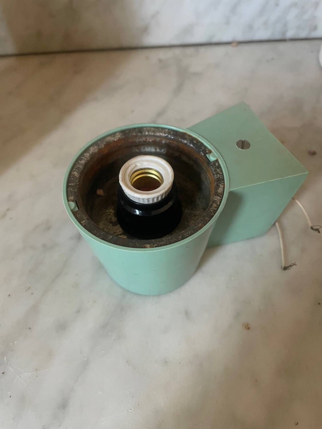 Opaline and Bakelite wall light from the 1950s.