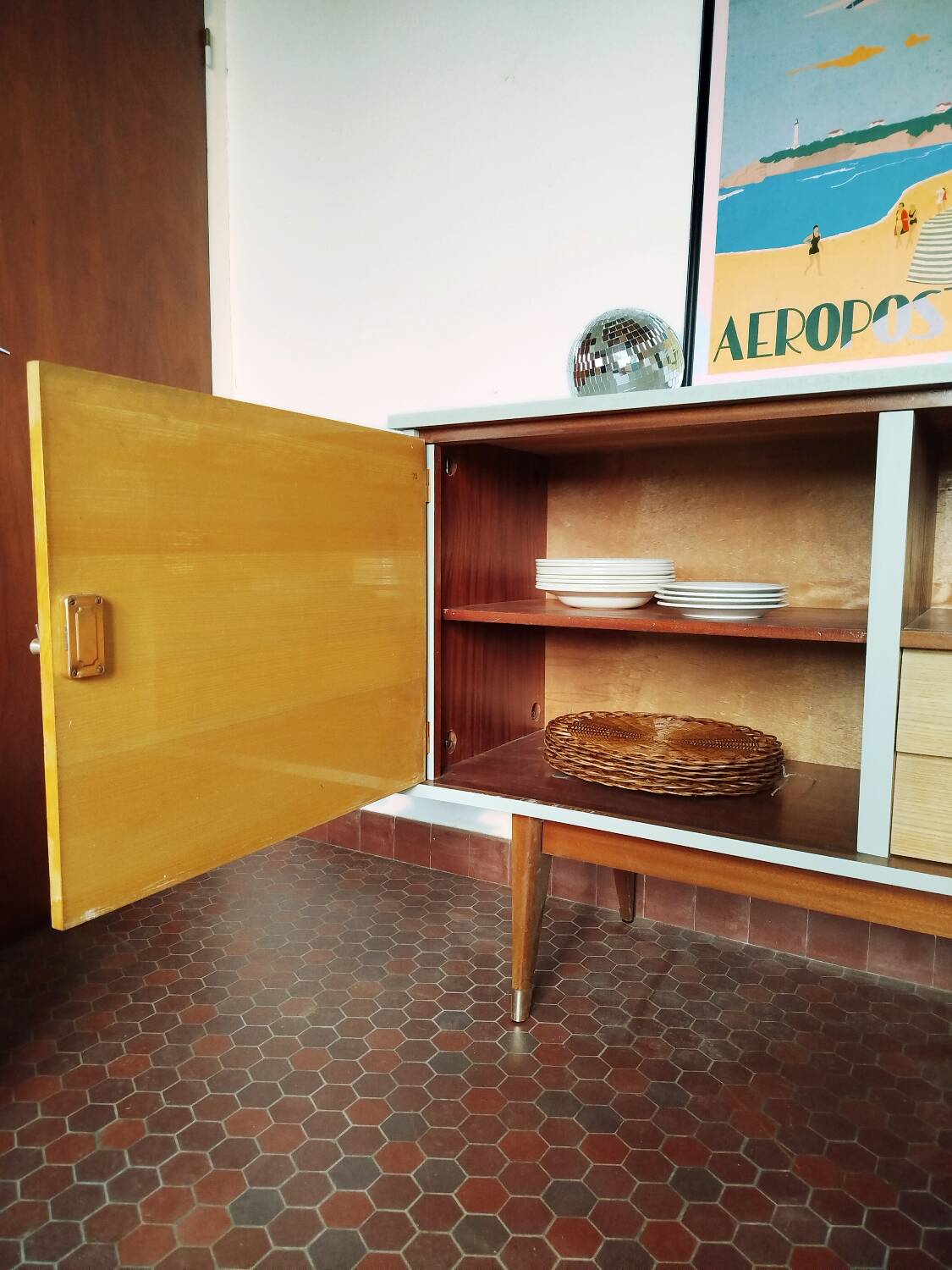 Wooden sideboard in soft green