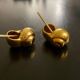 2 Snail-shaped salt pots in gold-colored porcelain