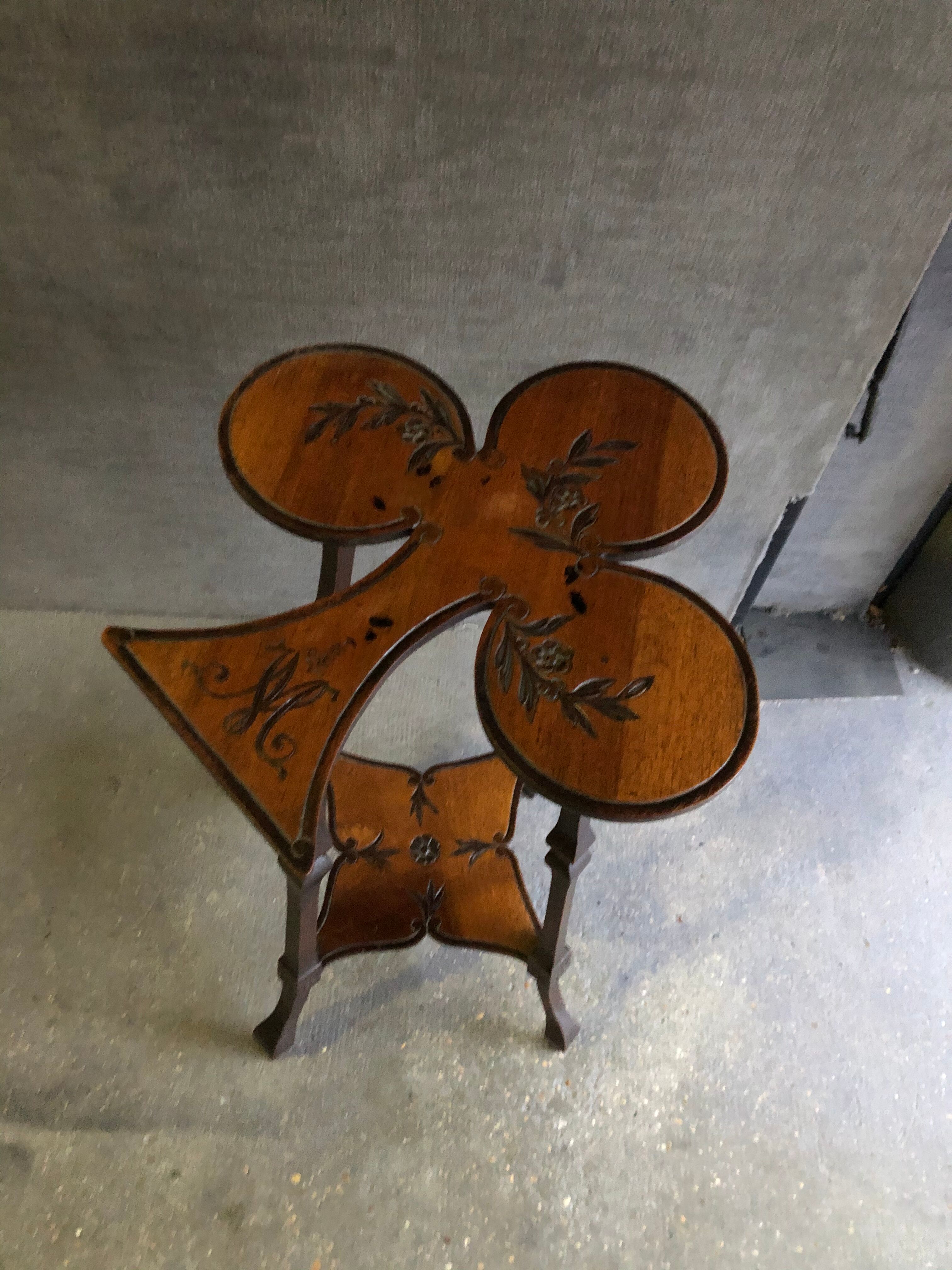 Art nouveau table with a pyrograved decoration