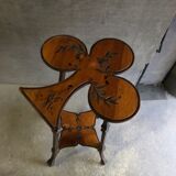 Art nouveau table with a pyrograved decoration