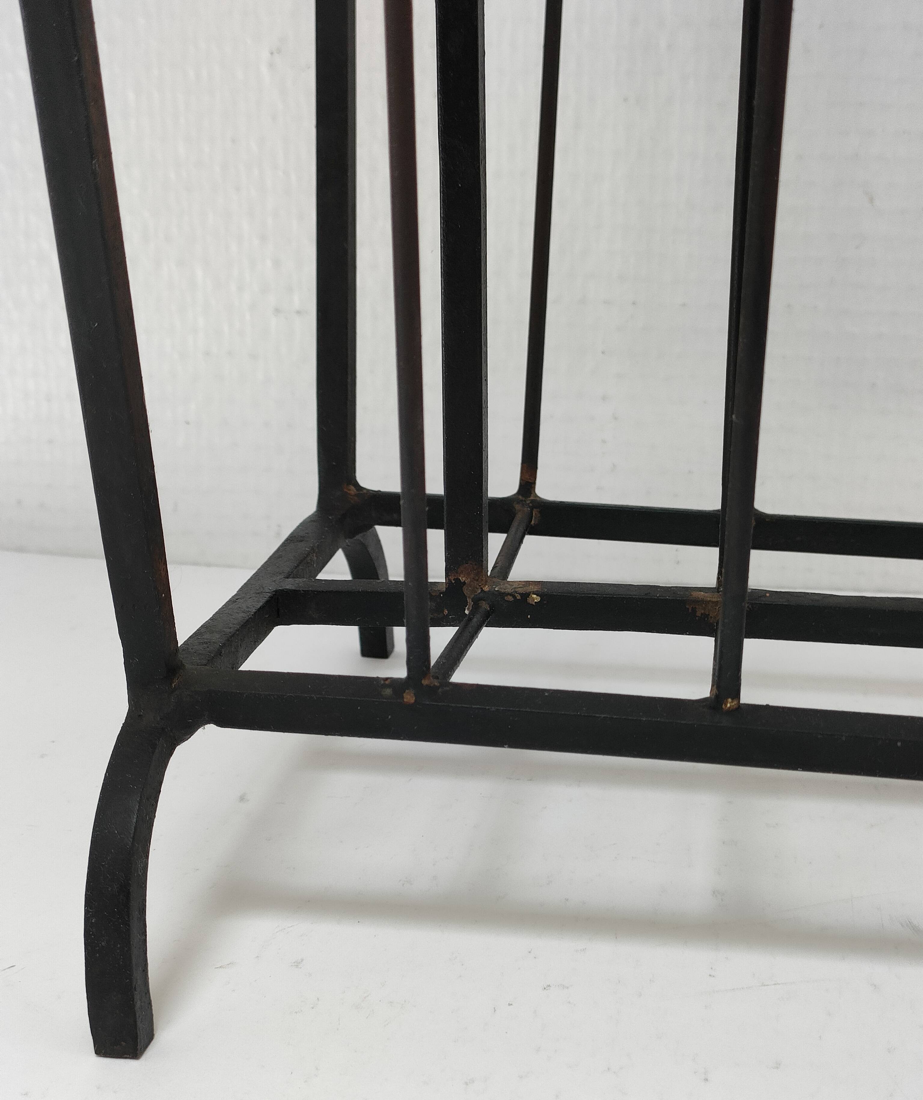 Modernist magazine holder black iron 60s