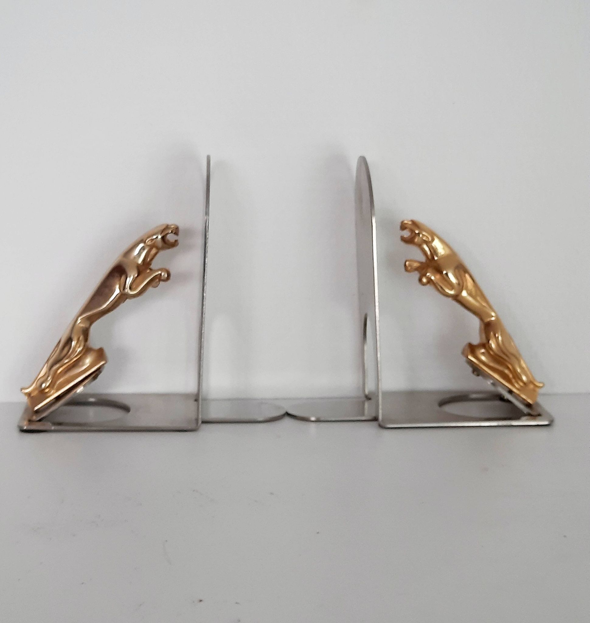 Pair of Jaguar brand mascot bookends from the 70s and 80s