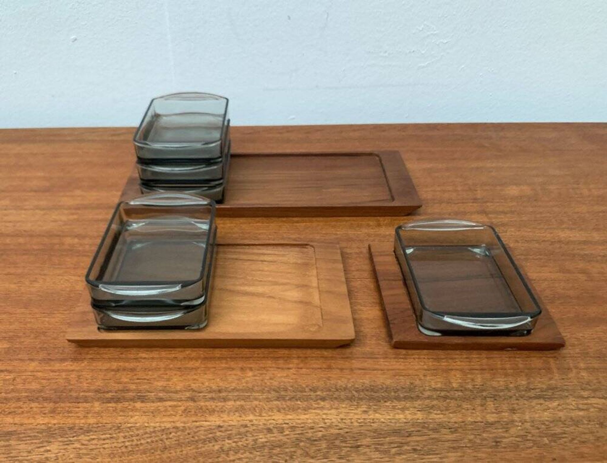 Danish mid-century teak plateau with Holmegaard glass serving trays, 1960s, set of 9.
