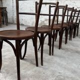 Série de 7 anciennes chaises bistrot Baumann bois courbé assise ronde