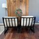 Set of two vintage black and white bamboo chairs.