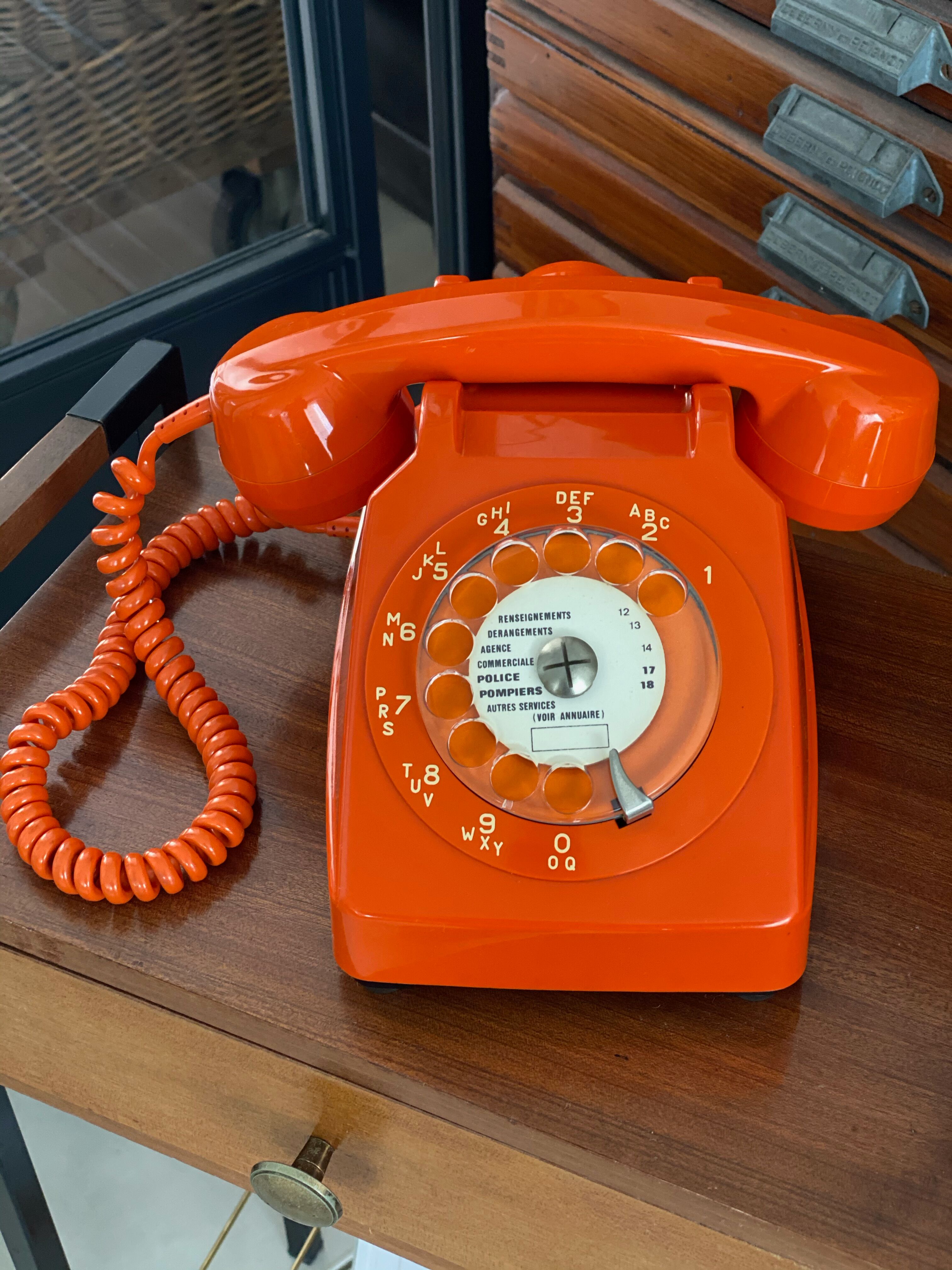 Vintage orange dial phone