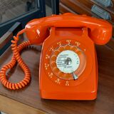 Vintage orange dial phone