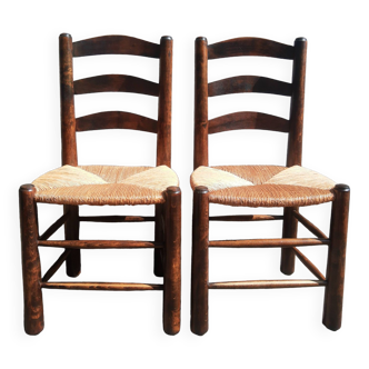 Pair of mulched brutalist chairs and wood