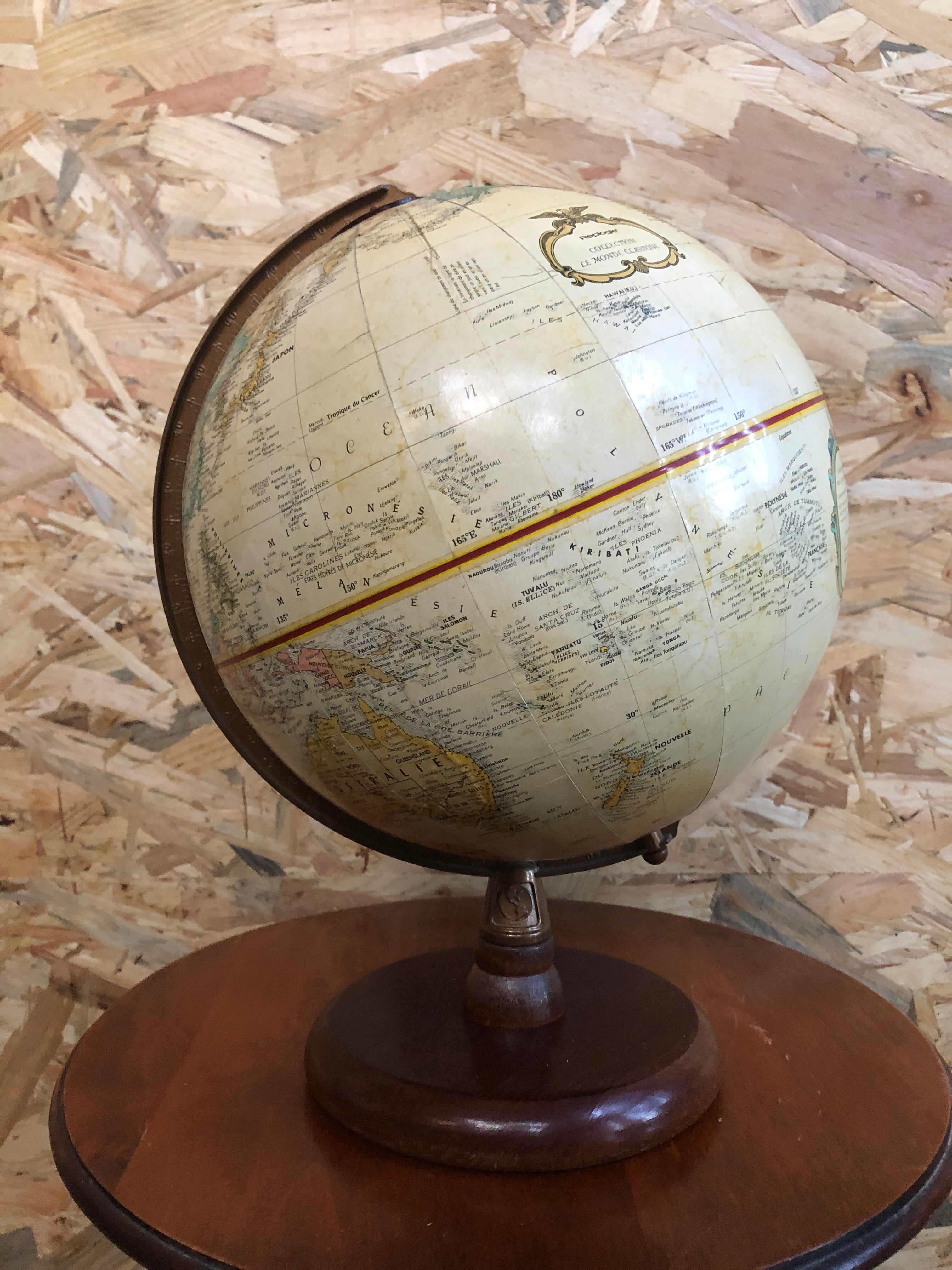 Old globe world map with arch + vintage wood base