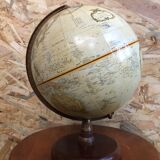 Old globe world map with arch + vintage wood base