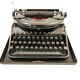 Machine à écrire Remington Noiseless portable noire de 1935 révisée ruban neuf