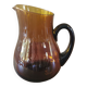 Vintage round pitcher amber glass